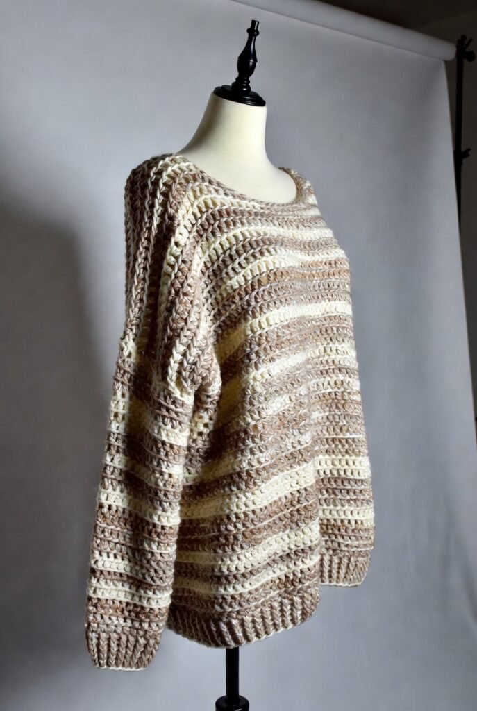 Handmade plus-size crochet sweater with oversized fit.