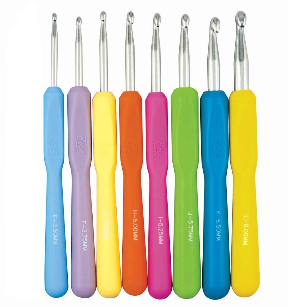 Boye ergonomic crochet hooks with colorful soft grip handles arranged on a clean surface.